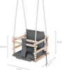 A baby swing with cushions, shown with dimensions indicated by measurement lines and text. Náhled obrázku produktu