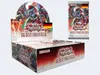 A display box and a booster pack of Yu-Gi-Oh! Burst Protocol trading cards, with German flag icons. Produktbild-Vorschau