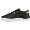 A side view of a black Puma sneaker with gold accents. Podgląd zdjęcia produktu