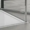A close-up view of the bottom corner of a shower enclosure, showing the track and glass. Produktbild-Vorschau