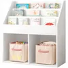 A white bookshelf filled with children's books and storage bins. Podgląd zdjęcia produktu