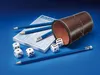 A dice game set including dice, pencils, and a scorepad, arranged on a blue surface. Produktbild-Vorschau