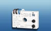 A white electronic timer relay device with colored wire connectors and adjustment knobs, set against a gradient blue and white background. Náhľad obrázku produktu