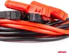 A close-up, studio shot of a coiled set of red and black jumper cables. Podgląd zdjęcia produktu