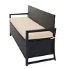 A black poly-rattan bench with a beige cushion, shown from a side angle against a white background. Podgląd zdjęcia produktu