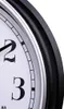 A close-up view of a clock face with numbers 2 and 3 visible. Anteprima dell’immagine prodotto