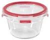 A clear, studio shot of a round glass food storage container with a red lid and locking mechanism. Náhľad obrázku produktu