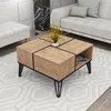 A modern living room setting with a couch, ottoman, and coffee table. Náhľad obrázku produktu