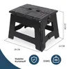 A black folding step stool with dimensions indicated. Produktbild-Vorschau