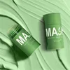 Two green cleansing sticks are displayed on a textured green background. Náhled obrázku produktu
