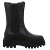 A black boot on a white background. Voir les images du produit
