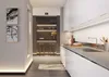 A modern kitchen and dining area with a bar setup. Produktbild-Vorschau