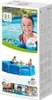 The image shows the packaging of an Intex Metal Frame Pool Set, featuring a young girl in the pool and a family enjoying the pool. Anteprima dell’immagine prodotto