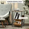 A side table next to an armchair, with books and a basket on it. Náhľad obrázku produktu