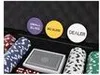 A close-up view of poker chips and a deck of cards. Podgląd zdjęcia produktu
