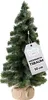 A small artificial Christmas tree with a burlap base and a tag. Produktbild-Vorschau