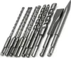 A set of drill bits and chisels arranged on a white background. Anteprima dell’immagine prodotto