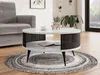 A modern living room scene featuring a round coffee table with a marble top and black metal slatted sides, placed on a circular rug in front of a gray sofa. Náhled obrázku produktu