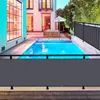 A dark gray privacy screen is installed in front of a wooden deck, with a swimming pool and a modern house in the background. Produktbild-Vorschau