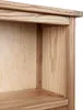 A close-up view of the corner of a wooden bookshelf. Náhľad obrázku produktu