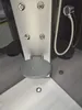 A close-up view of a shower cabin, focusing on the built-in soap dish and showerhead. Anteprima dell’immagine prodotto