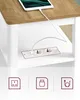 A side table with an integrated power strip and USB ports, charging a tablet. Náhled obrázku produktu