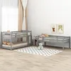 A bedroom scene with bunk beds and a single bed. Anteprima dell’immagine prodotto