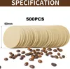 A pile of round coffee filters with coffee beans scattered in front of them. Produktbild-Vorschau