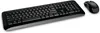 A black wireless keyboard and mouse set is displayed on a white background. Produktbild-Vorschau