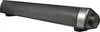 A black soundbar speaker with a silver accent and a volume knob on the right side, presented on a white background. Produktbild-Vorschau