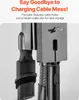 Close-up of a vacuum cleaner stand with accessories and text highlighting cable management. Voir les images du produit