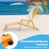 A wooden beach chair with a canopy is set up on a sandy beach with the ocean in the background. Podgląd zdjęcia produktu