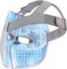 A close-up, angled view of the back of a white and gray LED facial mask with blue lights illuminated. Anteprima dell’immagine prodotto