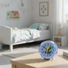 A child's bedroom with a bed and a clock on a table. Produktbild-Vorschau