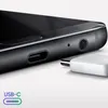 Close-up of a smartphone's charging port and a USB-C connector. Náhľad obrázku produktu
