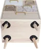 A wooden chest of drawers with decorative drawer fronts and gold handles, standing on four angled wooden legs. Náhled obrázku produktu