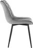 A side view of a single gray velvet dining chair with black metal legs, set against a white background. Produktbild-Vorschau