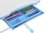 A close-up view of an open drawer on a child's desk, revealing various stationery items. Produktbild-Vorschau