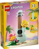 The image shows the packaging of a LEGO Creator 3-in-1 Tropical Ukulele set, featuring a built ukulele with flowers and palm trees in the background. Náhled obrázku produktu