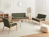 A living room scene with a sofa, two armchairs, and a coffee table. Náhled obrázku produktu