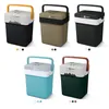 Collage of different colored portable coolers with handles and landscape graphics on the lids. Anteprima dell’immagine prodotto