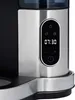 A close-up view of the control panel of a coffee machine. Voir les images du produit