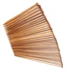 A collection of wooden knitting needles fanned out against a white background. Podgląd zdjęcia produktu