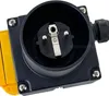 A close-up view of an electrical plug socket with a yellow connector attached. Produktbild-Vorschau