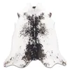 A cowhide rug on a white background. Voir les images du produit