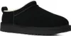 A single black slipper shoe is shown from a side-angle on a white background. Anteprima dell’immagine prodotto