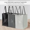 Three recycling bags lined up in a room. Produktbild-Vorschau