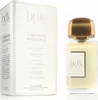 A perfume bottle and its box are displayed side-by-side against a white background. Voir les images du produit