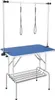 A grooming table for pets, with adjustable restraints and a storage shelf. Anteprima dell’immagine prodotto
