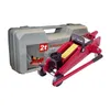 A red hydraulic car jack and its gray carrying case are displayed against a white background. Voir les images du produit